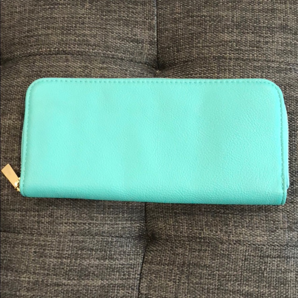 Tiffany blue zip around wallet. NEVER BEEN USED